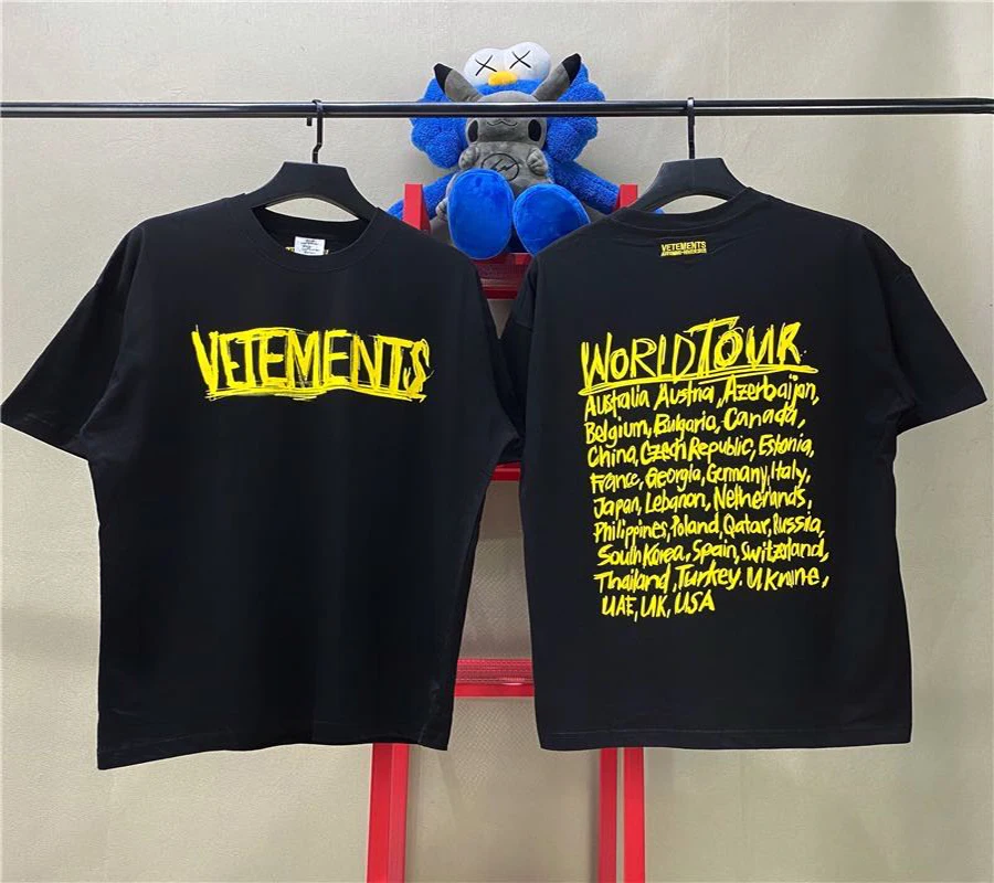 Ir 2021. Vetements T-Kreklu Grafiti Dzeltena Vēstules World Tour Pilsētas Koordinēt Tee Vīrieši Sievietes augstas Kvalitātes Ikdienas Kokvilnas VTM T-krekli